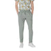 Light green drawstring trousers for men displayed in the product listing
