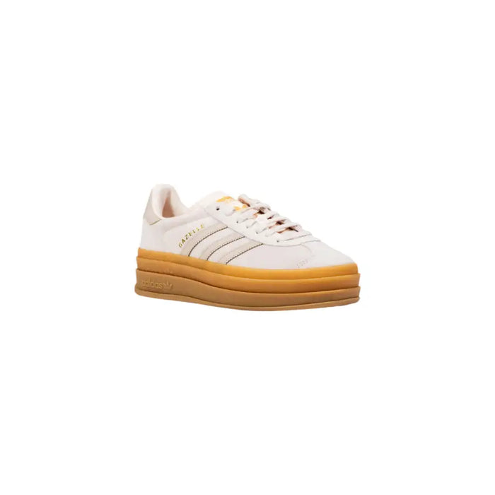 Light pink Adidas Gazelle sneakers with a platform gum sole for women