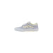 Light purple and white Vans skate shoe featured in Vans Women’s Beige Leather Sneakers