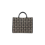 Black and cream patterned tote bag with a top handle from Liu Jo featuring a shoulder strap
