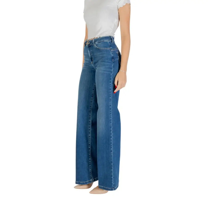 Woman wearing Liu Jo Blue Ankle Length Jeans and white t-shirt showcasing casual style