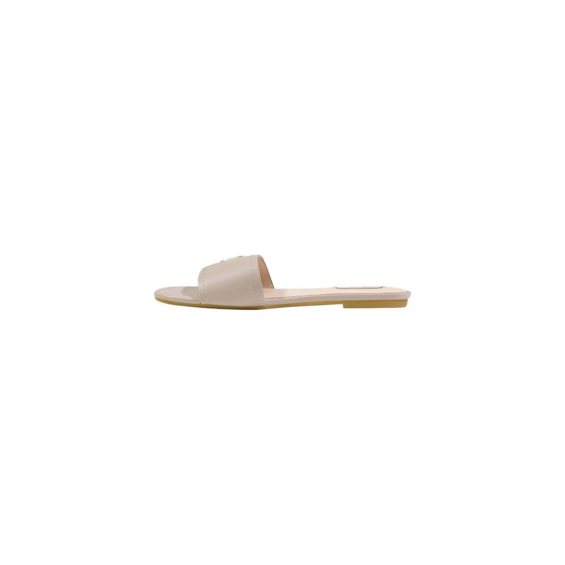 Beige leather slide sandal by Liu Jo with minimalist design and flat sole for women spring shoes