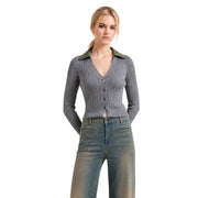 Gray ribbed knit cardigan with olive green collar and button closure shown with Liu Jo women white floral wool blend sweater