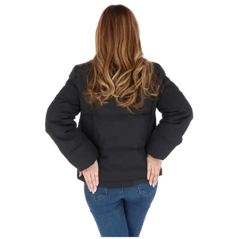 Love Moschino black quilted puffer jacket with long sleeves and zip pockets for casual outerwear
