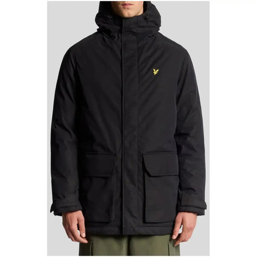 Black parka jacket with hood and multiple pockets, featuring a lyle & scott logo on the chest.
