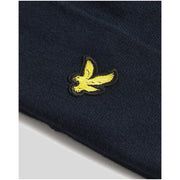 Navy blue fleece blanket with yellow bird logo, lyle & scott brand.