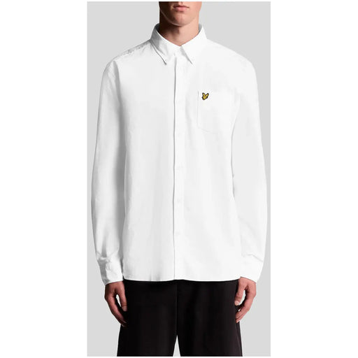 Men’s white long-sleeve cotton shirt with small embroidered emblem and single pocket