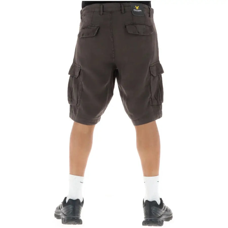 Cargo shorts with multiple pockets, dark brown color, durable fabric material.