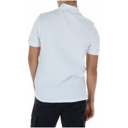 Polo homme Lyle Scott blanc à manches courtes en coton et élasthanne, col classique et tissu légèrement texturé.