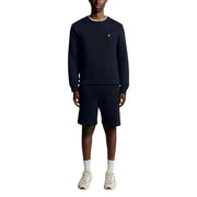 Sweat-shirt homme Lyle and Scott bleu marine en coton, col rond, finitions blanches et petit logo oiseau jaune sur la poitrine.
