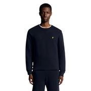 Sweat-shirt bleu marine en coton à col rond, col côtelé blanc et petit logo oiseau jaune de la marque Lyle and Scott
