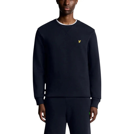 Sweat-shirt bleu marine Lyle and Scott pour homme, en coton, avec finitions côtelées blanches et logo oiseau doré sur la poitrine.