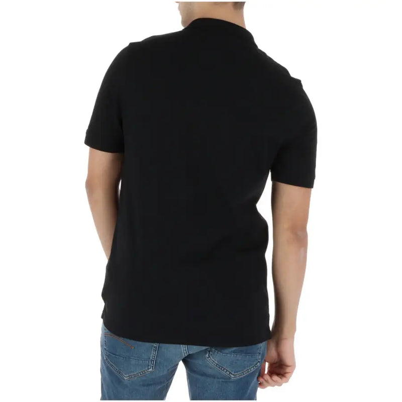 Lyle & Scott men’s black short-sleeved polo shirt with classic collar and ribbed cuffs made from soft cotton blend