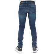 Back view of Lyle and Scott men’s slim fit dark blue denim jeans with worn out effect and black waistband label