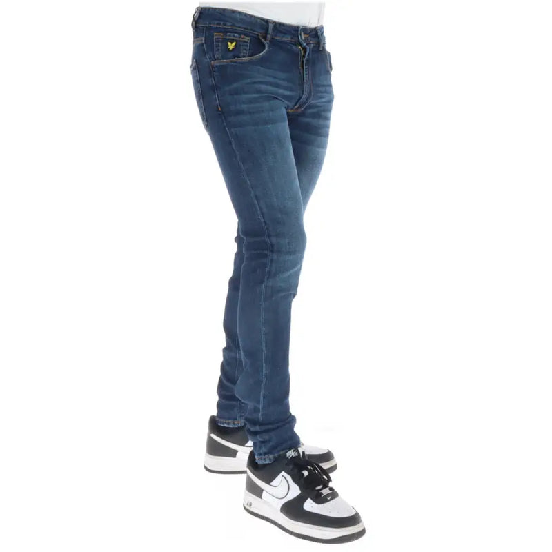 Back side of Lyle & Scott men’s blue slim fit denim jeans with worn-out effect and yellow bird logo on pocket