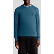 Teal crew neck sweater with yellow logo, lyle & scott brand.