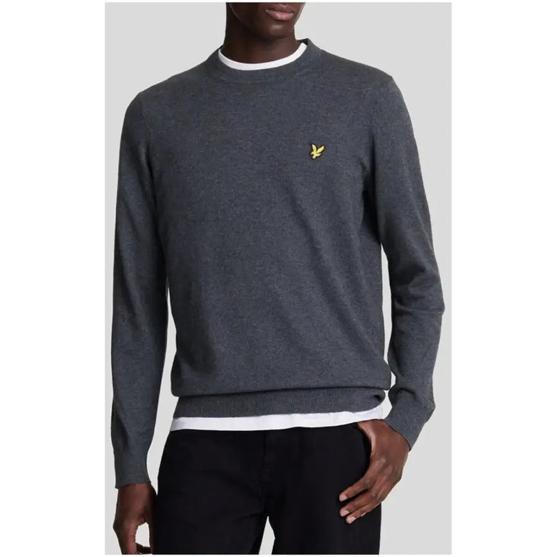 Charcoal gray crew neck sweater with white trim and yellow logo, lyle & scott brand.