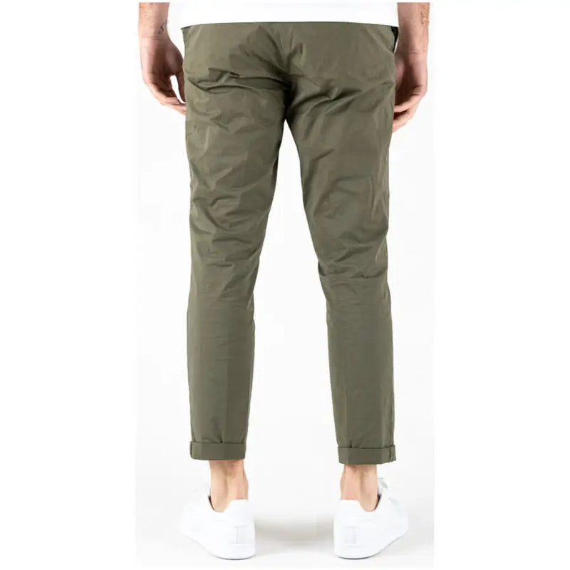 Olive green slim-fit chino pants with rolled cuffs in cotton blend featuring pockets by lyle and scott