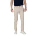 Man in beige pants and white sneakers showcasing Jeckerson Mens Blue Cotton Trousers