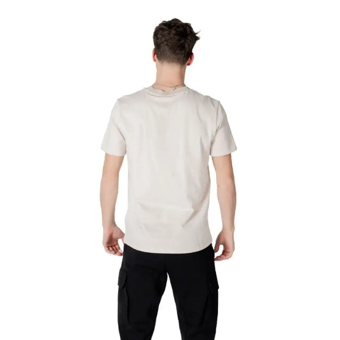 Man in beige t-shirt and black cargo pants showcasing Antony Morato Men’s White Round Neck Cotton T-Shirt