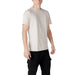 Man wearing beige t-shirt and black pants showcasing Antony Morato Men’s White Round Neck Cotton T-Shirt