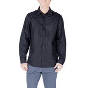 Man wearing Dark Wrinkled Long Sleeved Button Down Shirt in a product image