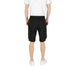 Man wearing Men’s Black Cargo Shorts showcasing durable and comfortable casual wear