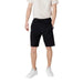 Man in Armani Exchange Men’s Black Shorts featuring laces and pockets