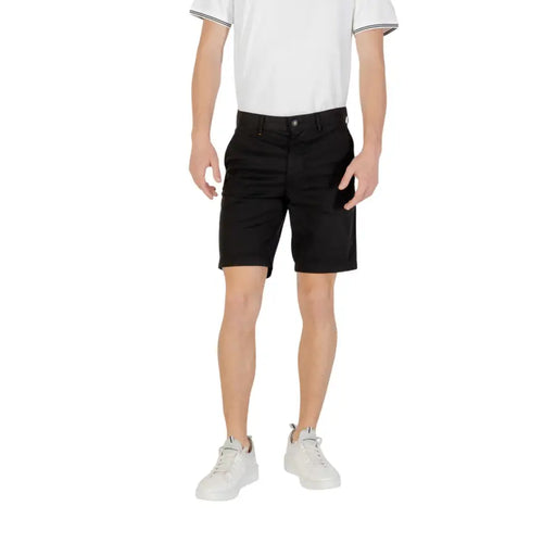 Man wearing Black Men’s Belted Shorts showcasing stylish menswear fashion
