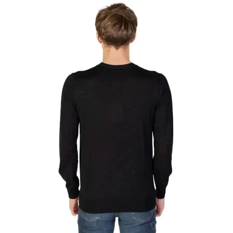 Man in black sweater and jeans from Liu Jo Men Knitwear collection by Liu Jo