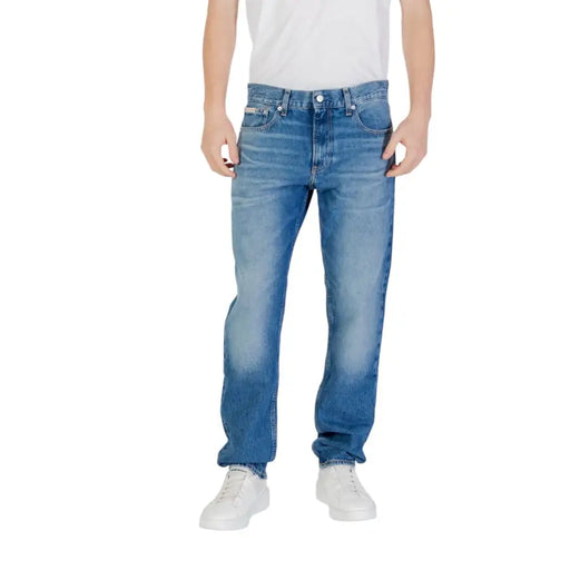 Man wearing blue denim jeans for men showcasing stylish casual wear
