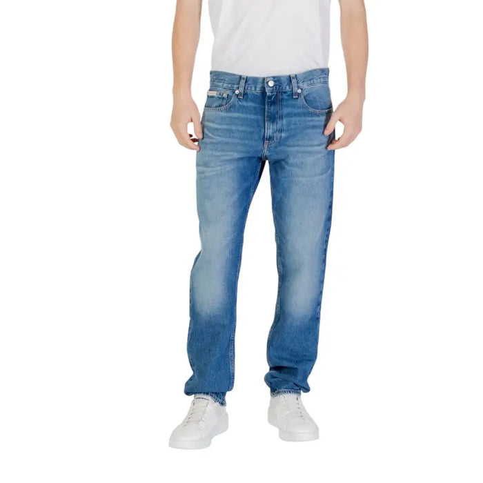 Man wearing blue denim jeans for men showcasing stylish casual wear
