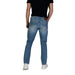 Man model showcasing Guess Men Blue Jeans from the Spring Summer Collection
