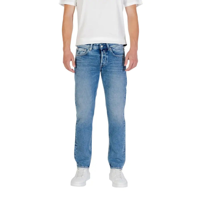 Man wearing Light Blue Denim Jeans for Men and a white T-shirt