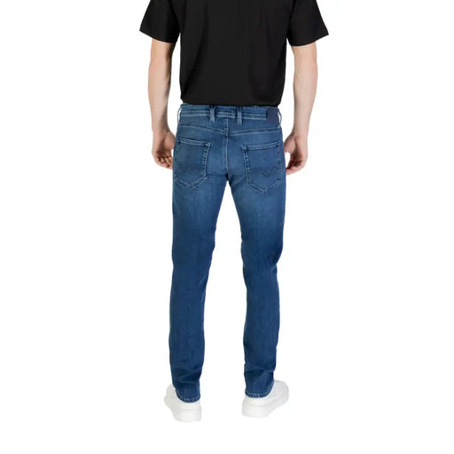 Man wearing Mens Blue Denim Jeans showcasing stylish men’s casual wear in blue denim
