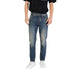 Man wearing Blue Jeans and White Sneakers showcasing men’s casual fashion style