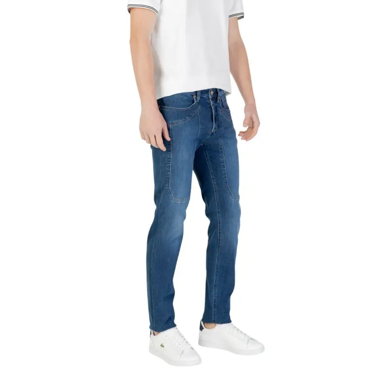 Man wearing blue jeans and white sneakers displayed in the product listing