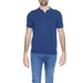 Man wearing a blue polo shirt from Diktat Men Knitwear collection