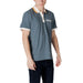 Man wearing a blue Napapijri Cotton Polo Shirt in a stylish setting