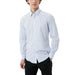 Antony Morato men shirt for fall winter, man in blue shirt and black pants.