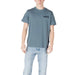 Man in a blue T-shirt and jeans wearing Napapijri Men T Shirt Black Print Slip On Round Neck