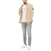 Man in casual attire wearing Calvin Klein white crew neck T-shirt for men