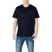 Man in a dark blue t-shirt and jeans showcasing Armani Exchange Men White Cotton T-Shirt
