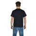 Man wearing a Navy Blue Graphic Tee for Men with blue jeans