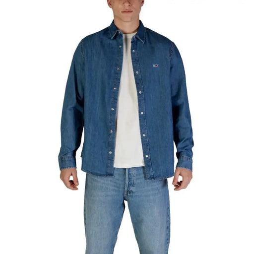 Man in denim shirt and jeans wearing Tommy Hilfiger Men’s Blue Long Button Shirt