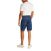 Man modeling white T-shirt and blue denim shorts with cuffed hems