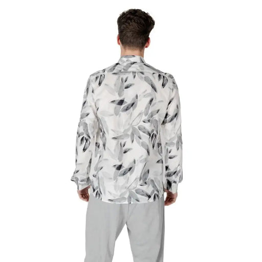 Man in floral print shirt showcasing Antony Morato White Floral Classic Shirt