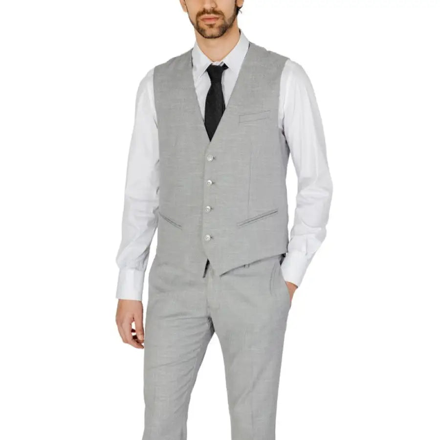 Stylish Antony Morato Men Gilet modeled by man in grey suit and tie.