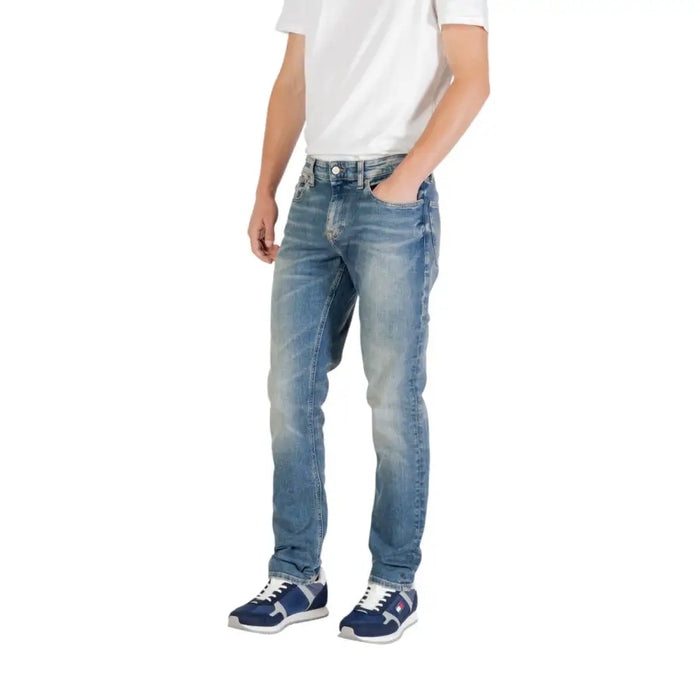 Man wearing light blue jeans and blue sneakers from Men Light Blue Jeans and Blue Sneakers collection