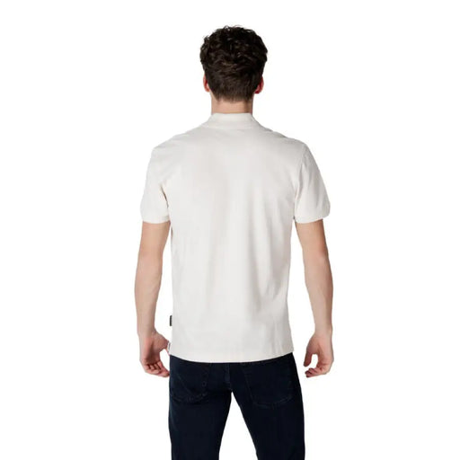 Man wearing Napapijri White Cotton Polo with dark pants, ideal for Spring Summer